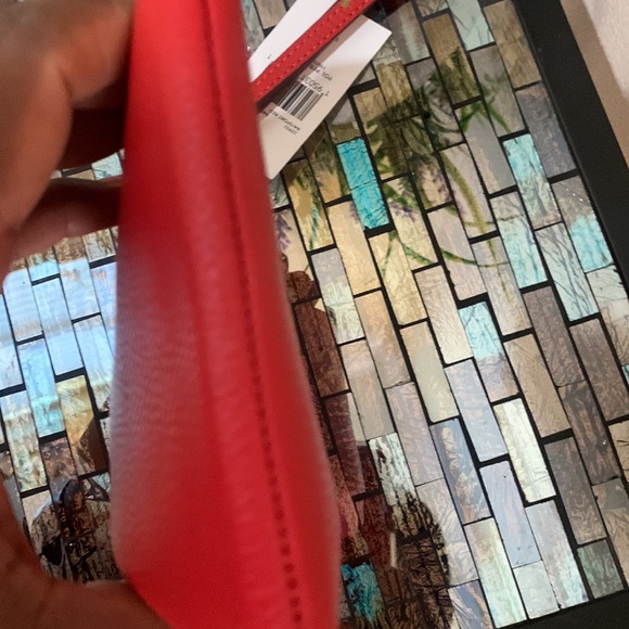 Coach Leather Wristlet
COACH - Picture 14 of 17